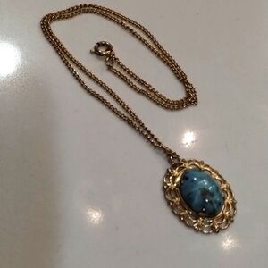 Turquoise and brown stone set in filagree gold tone necklace 9 inches long